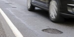 Does my auto insurance cover damage caused by potholes?